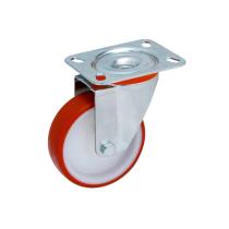 Kotač za transportne uređaje s rotirajućom pločicom